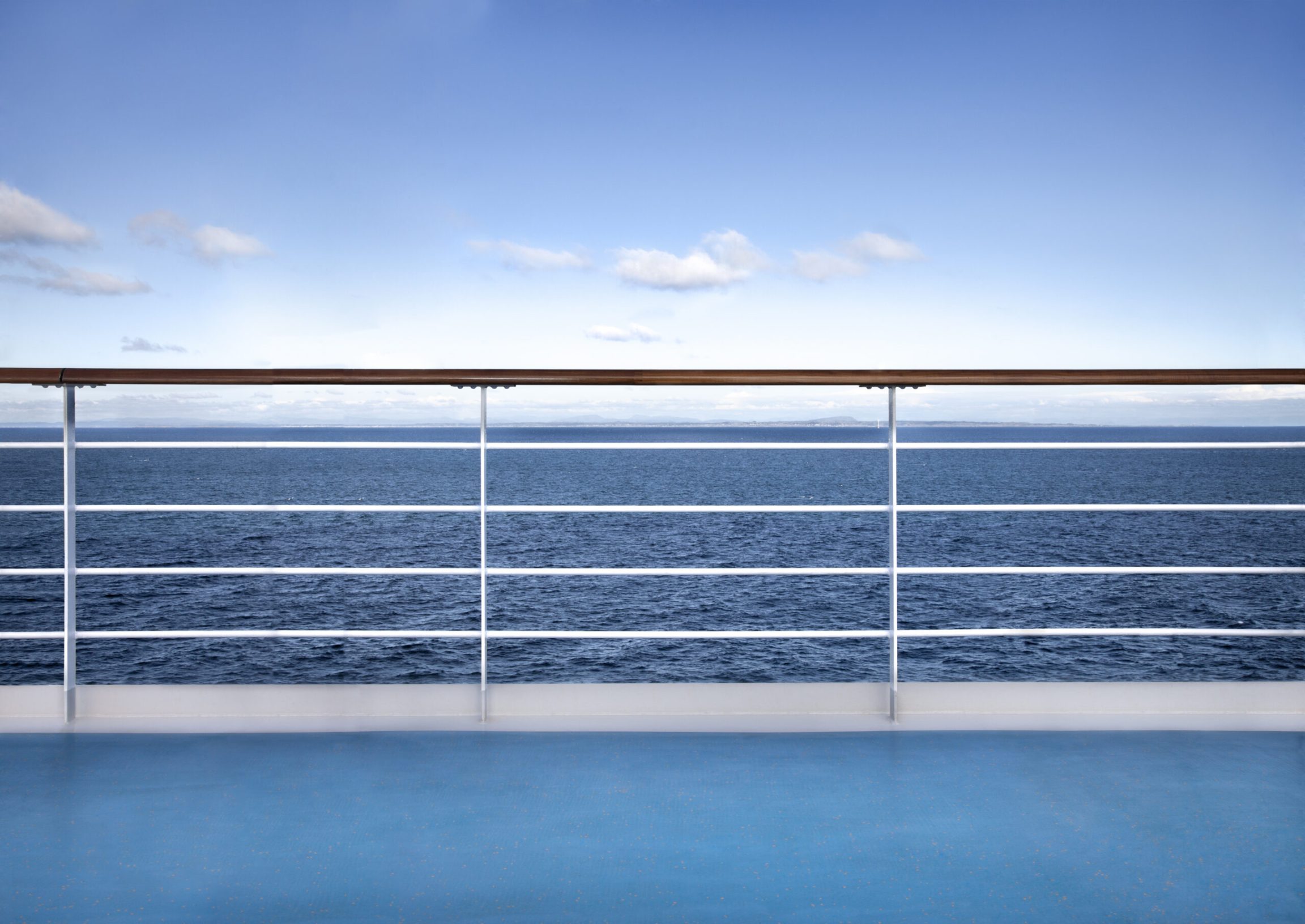 Railing deck of cruise ship against relaxing seascape. Travel concept