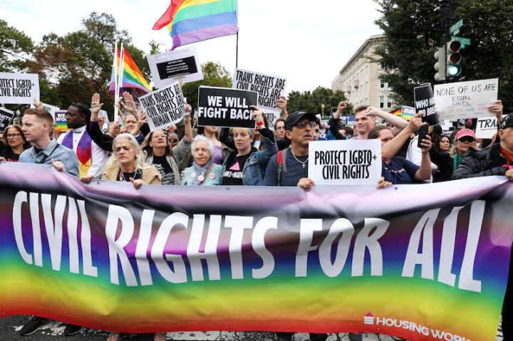 Activists and supporters block the street outside the U.S. Supreme Court in Washington Oct. 8, 2019, as it hears arguments in three major employment discrimination cases on whether federal civil rights law prohibiting workplace discrimination on the "basis of sex" covers gay and transgender employees. (CNS photo/Jonathan Ernst, Reuters) See SCOTUS-EMPLOYMENT-DISCRIMINATION Oct. 8, 2019, and SCOTUS-DISCRIMINATION-ARGUMENTS Oct. 9, 2019.